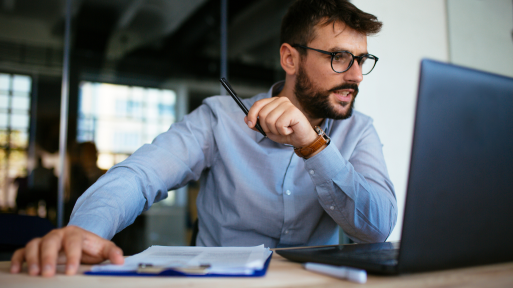 Business owner reviewing customer feedback after resolving a complaint