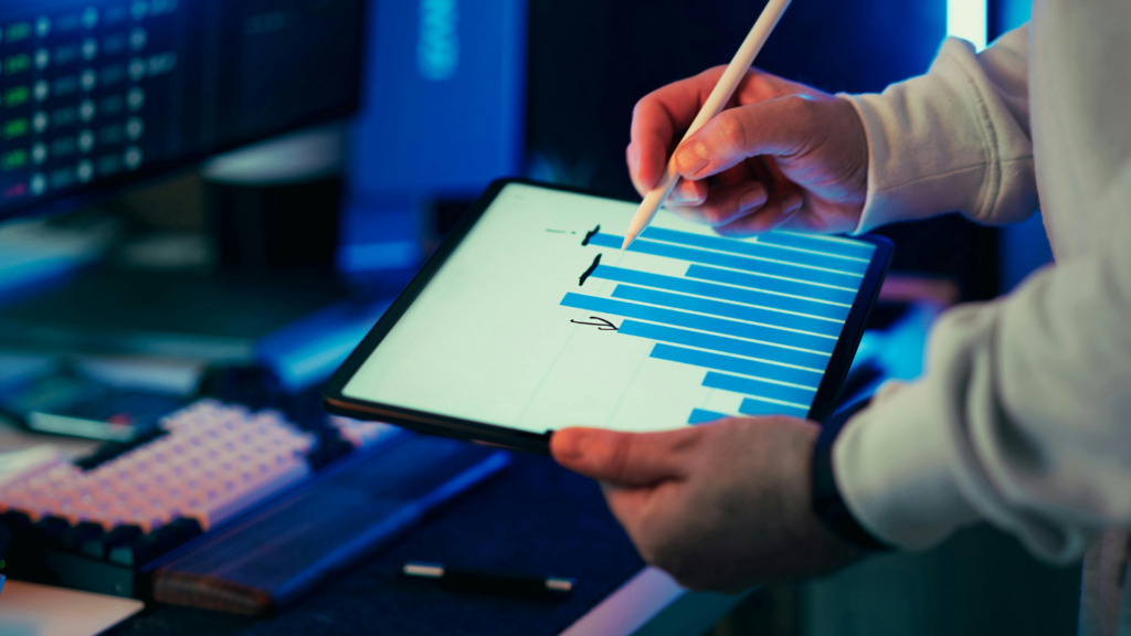 Business owner tracking local ranking data on a tablet chart