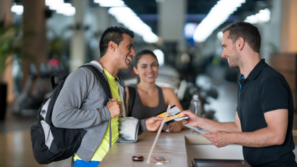 Front desk interaction reflecting strong customer service at a local gym