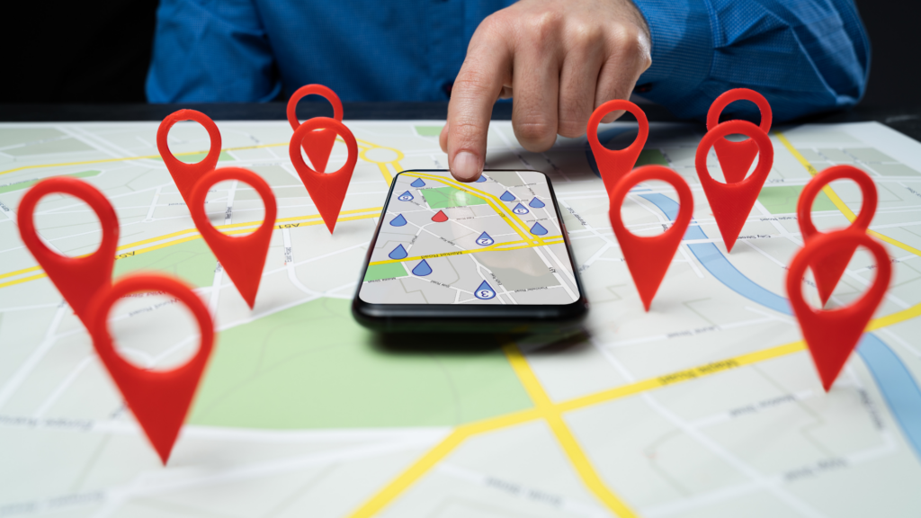 Person using multi-location SEO to mark several branch locations
