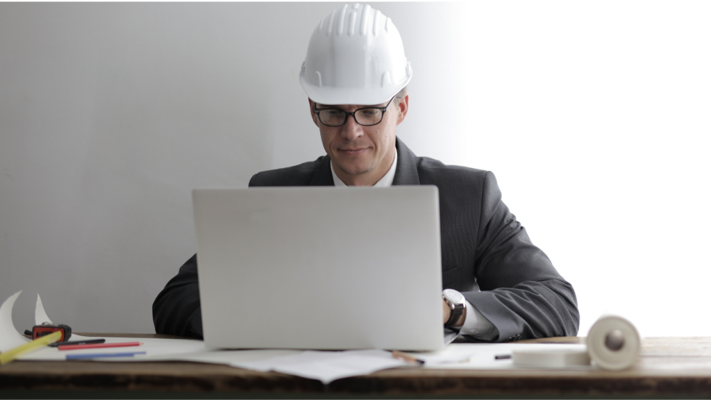Roofing contractor reviewing SEO performance data on his laptop