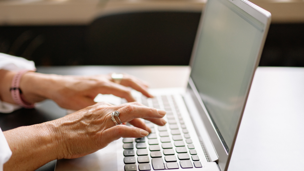 Close-up of hands searching for service-based local SEO tips
