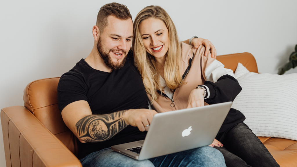 Couple researching insurance coverage options together before making a decision