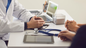 Doctor and patient discussing care during a clinic consultation