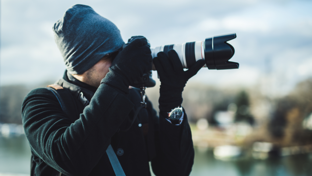 Photographer capturing outdoor shots to grow client bookings